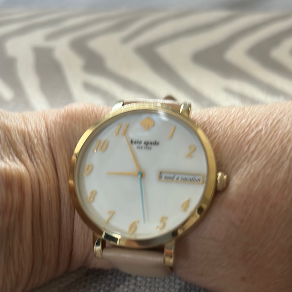 Kate Spade Gold and White Wearable Watch
Just needs a new battery